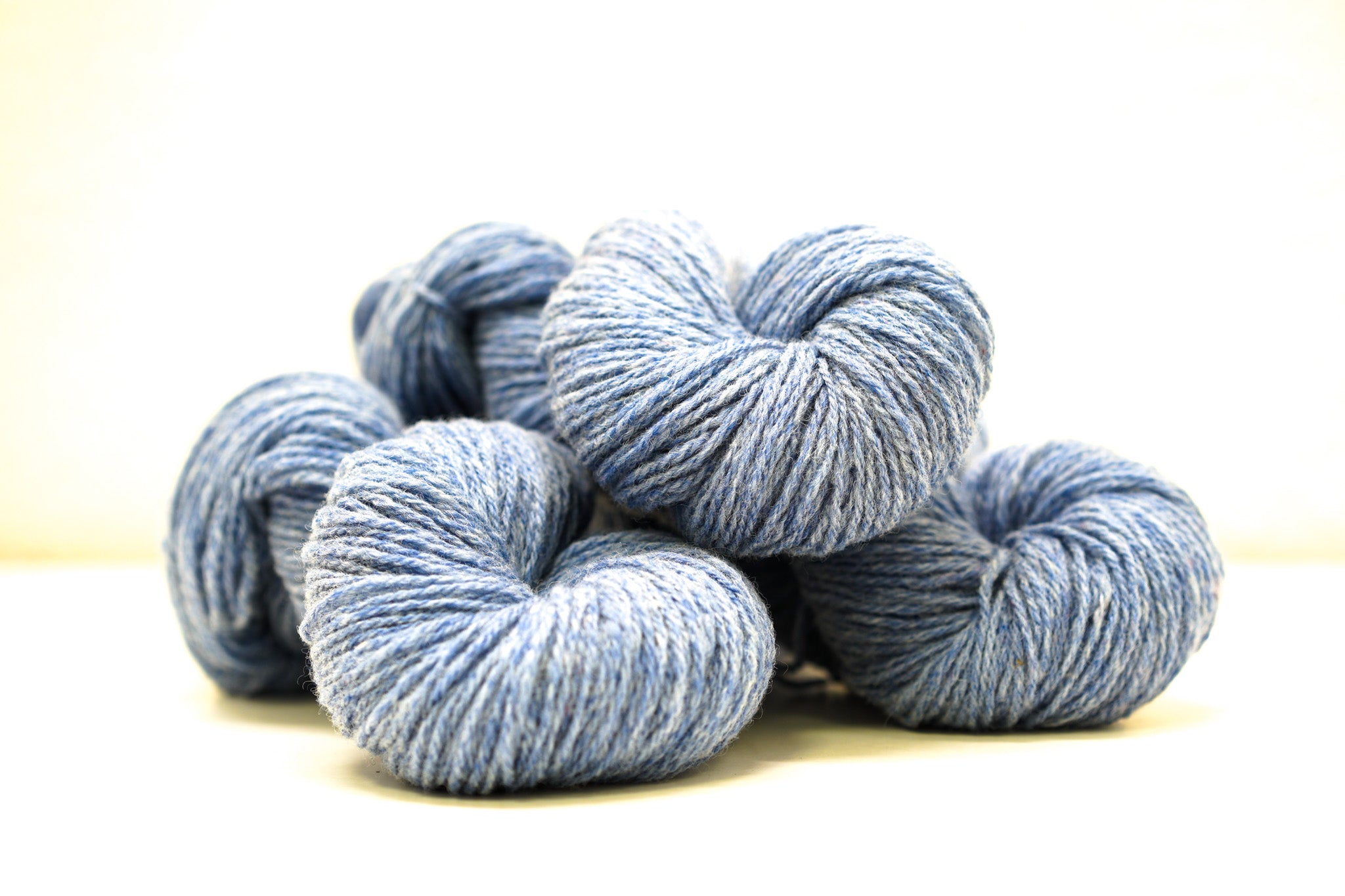 Blue melange color Merino and Suffolk wool yarn blend