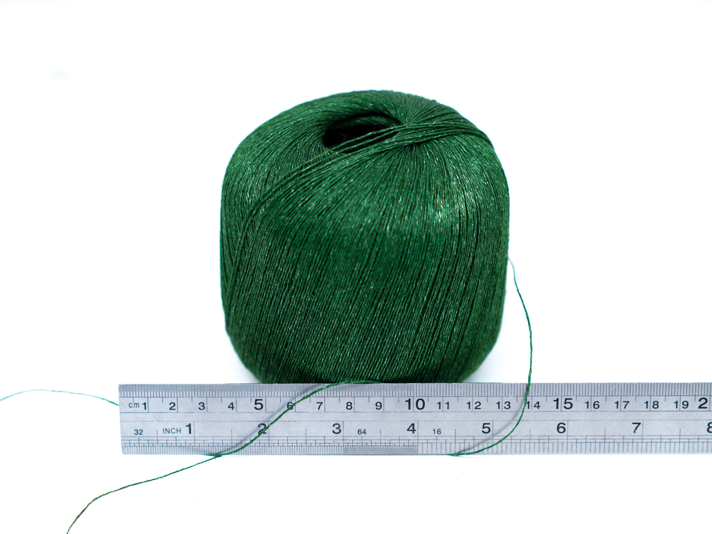 100% linen yarn in green mélange color 100g./600m.
