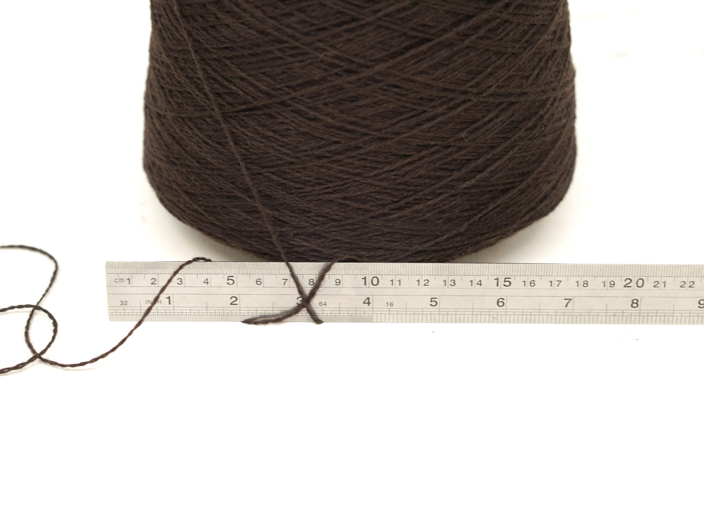 Dark brown color wool in cone - 269