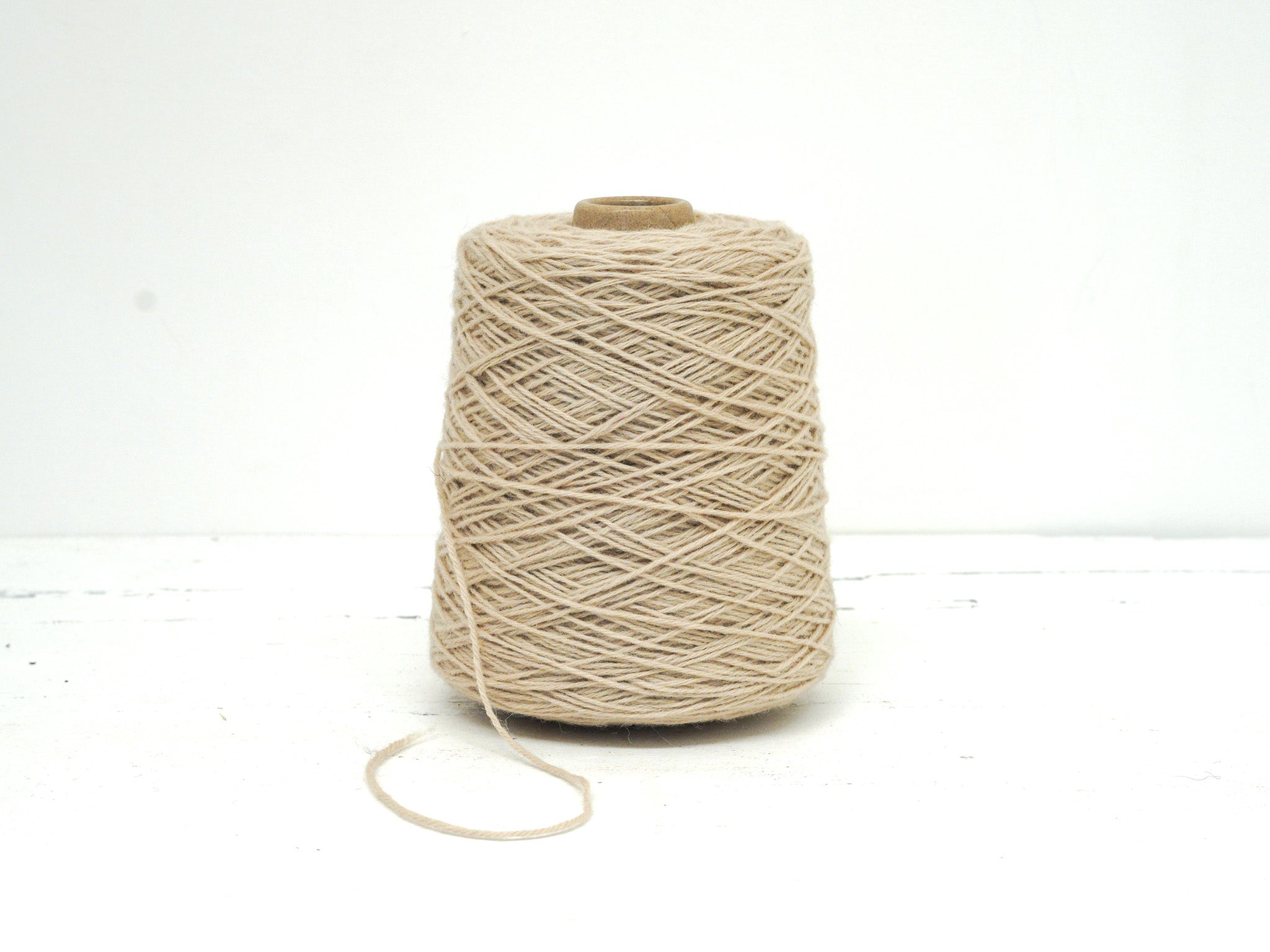 Ivory color wool yarn in cone - 260