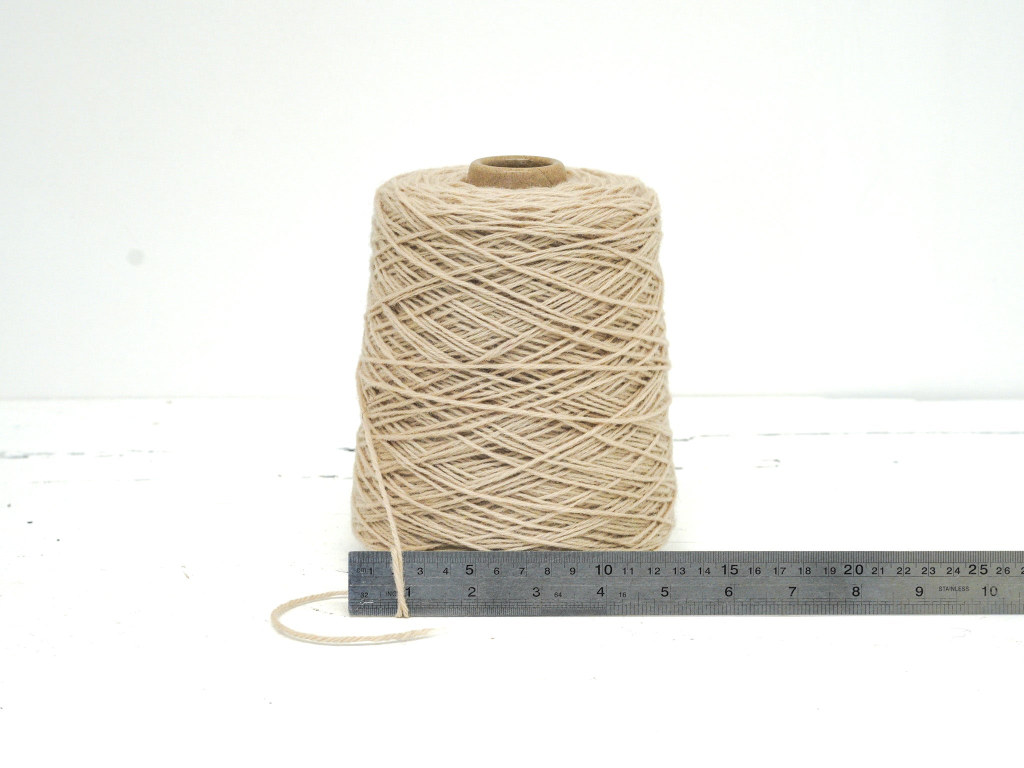 Ivory color wool yarn in cone - 260