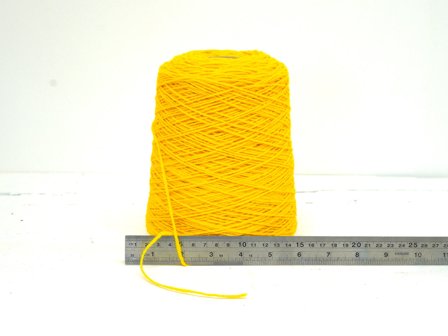 Yellow tufting wool yarn in cone - 710