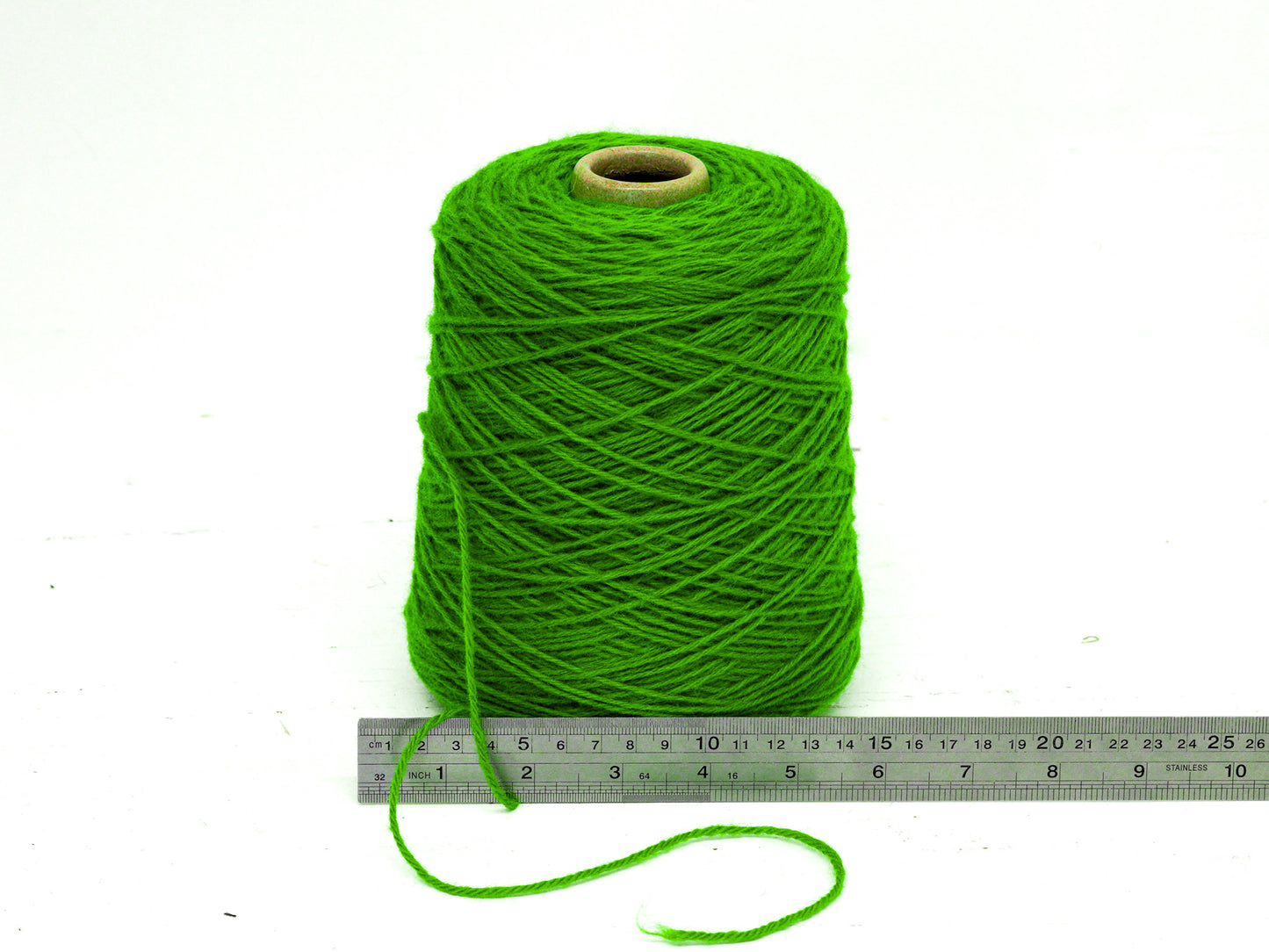 Bright green wool yarn in cone - 345