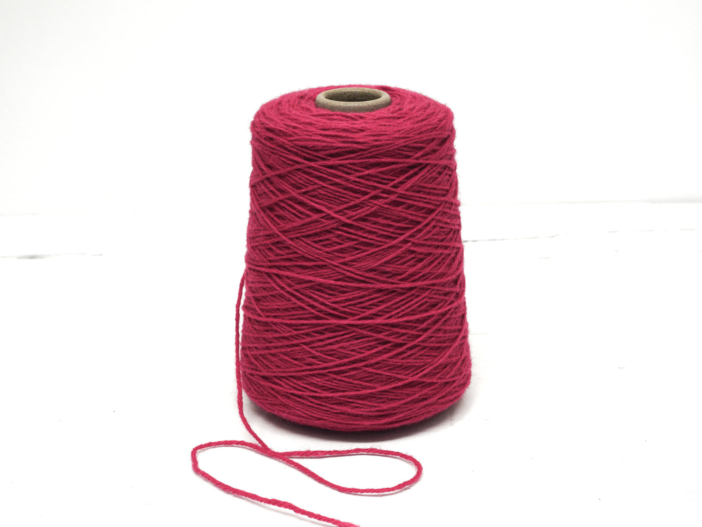 Raspberry wool yarn in cone - 555