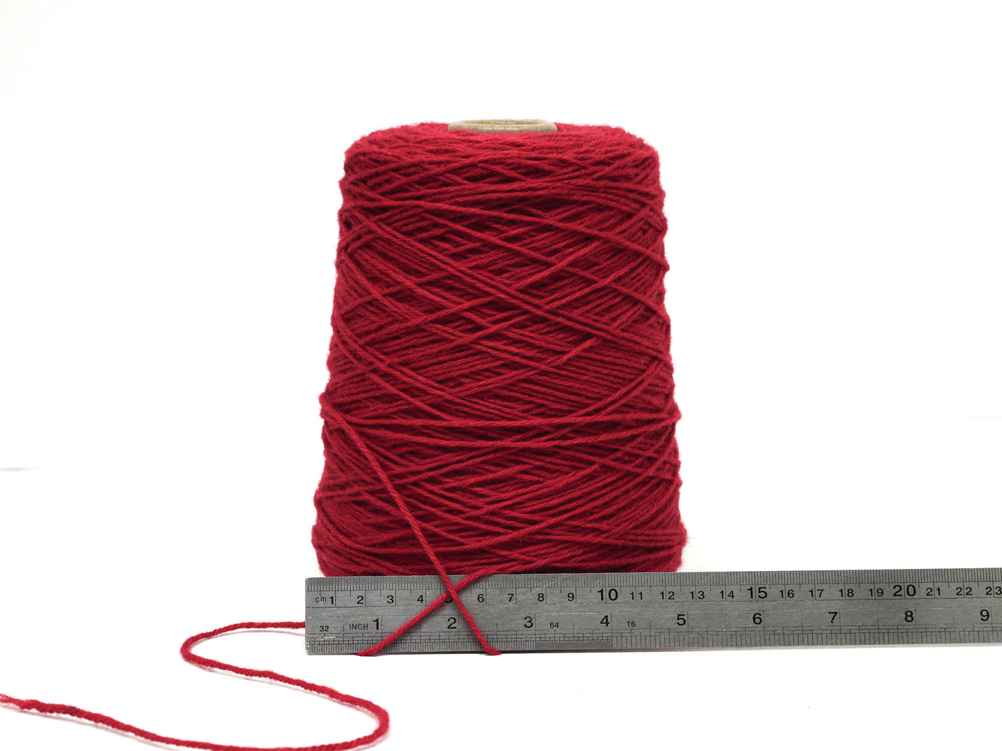 Bright red wool yarn in cone - 560