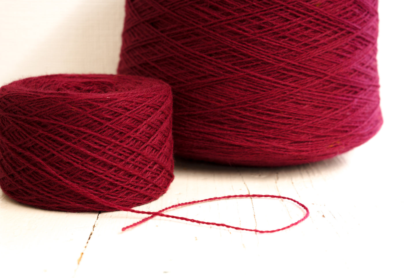 Red Wine fingering wool yarn in cones - 565