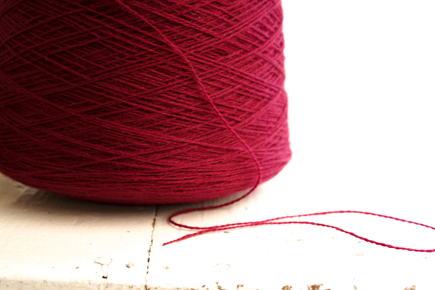 Red Wine fingering wool yarn in cones - 565