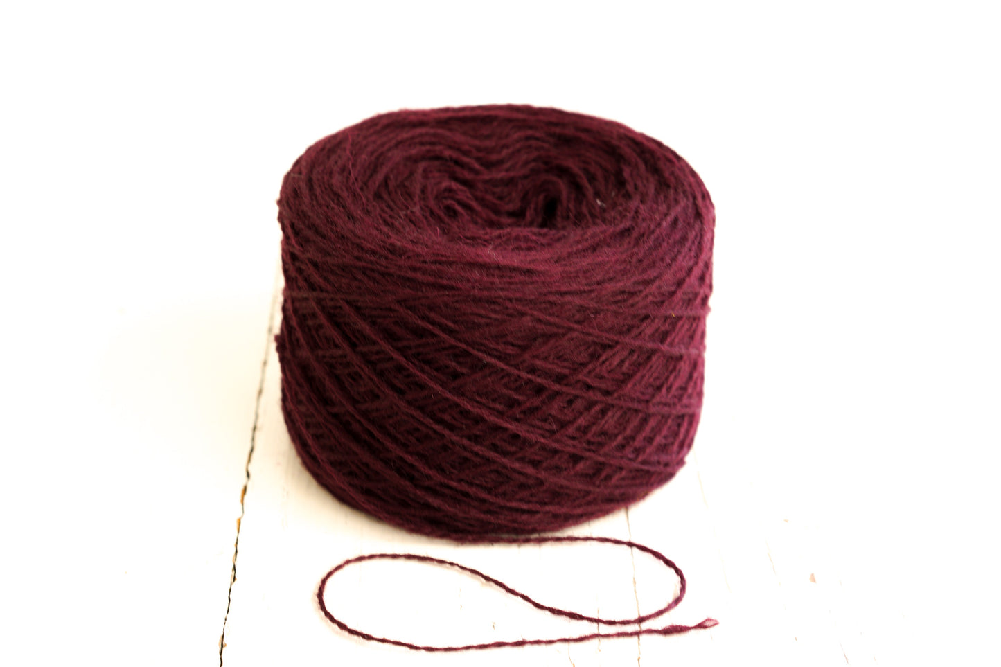Burgundy Red fingering wool yarn in cones - 575
