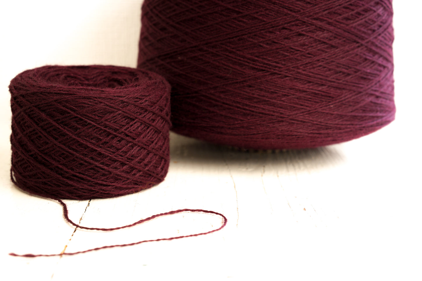 Burgundy Red fingering wool yarn in cones - 575