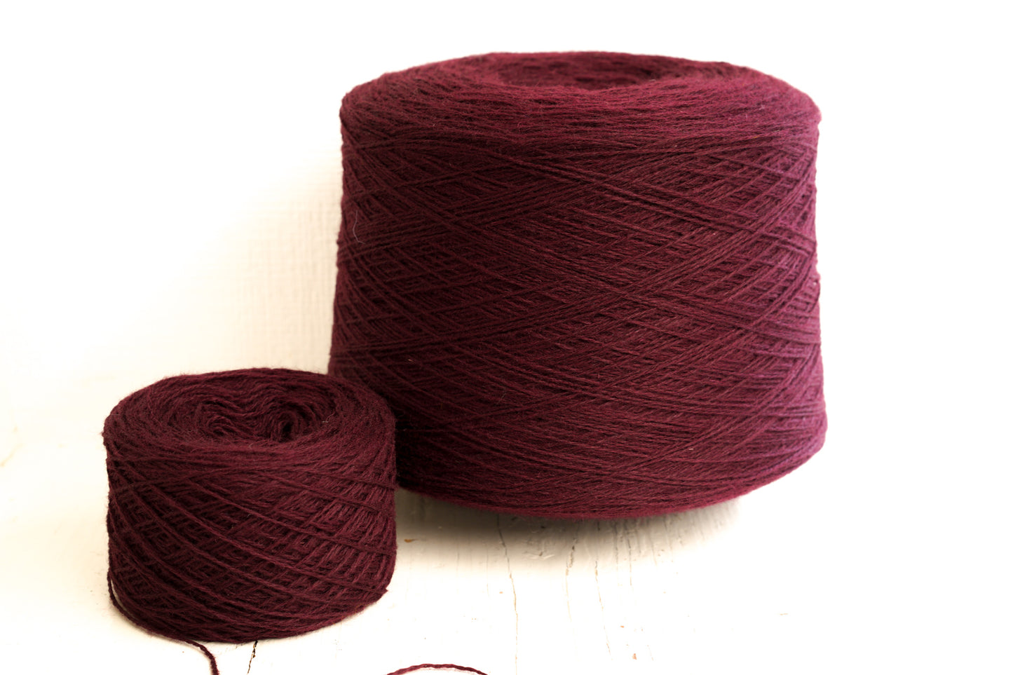 Burgundy Red fingering wool yarn in cones - 575