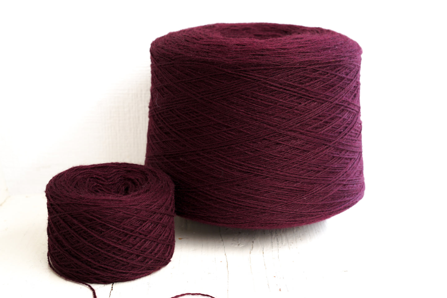 Burgundy Red fingering wool yarn in cones - 575