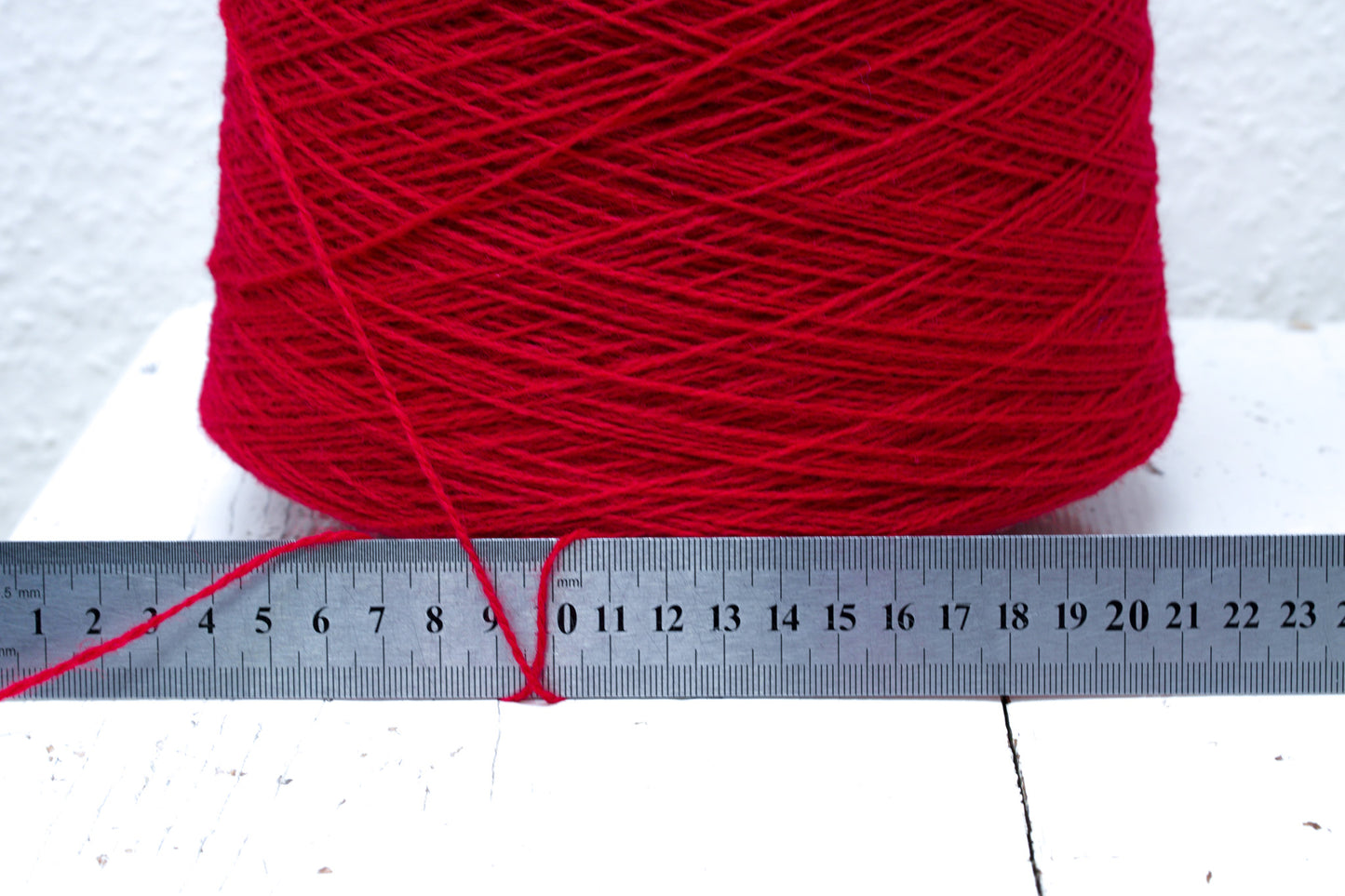 Bright red wool in cone - 560