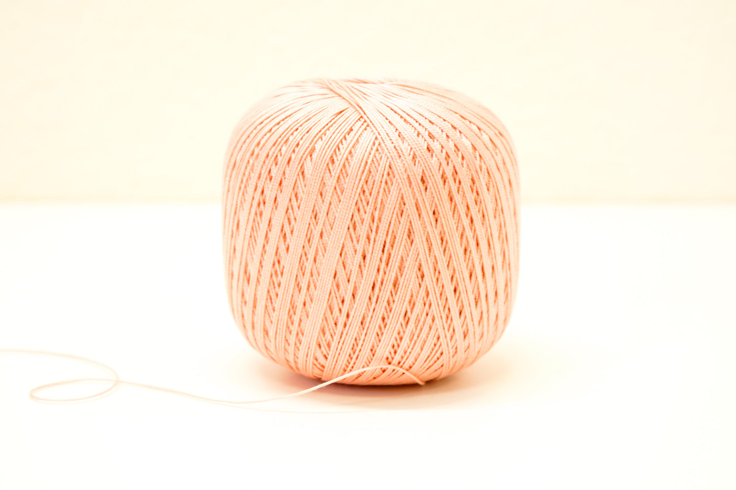 Light peach color mercerised cotton 100g/452m