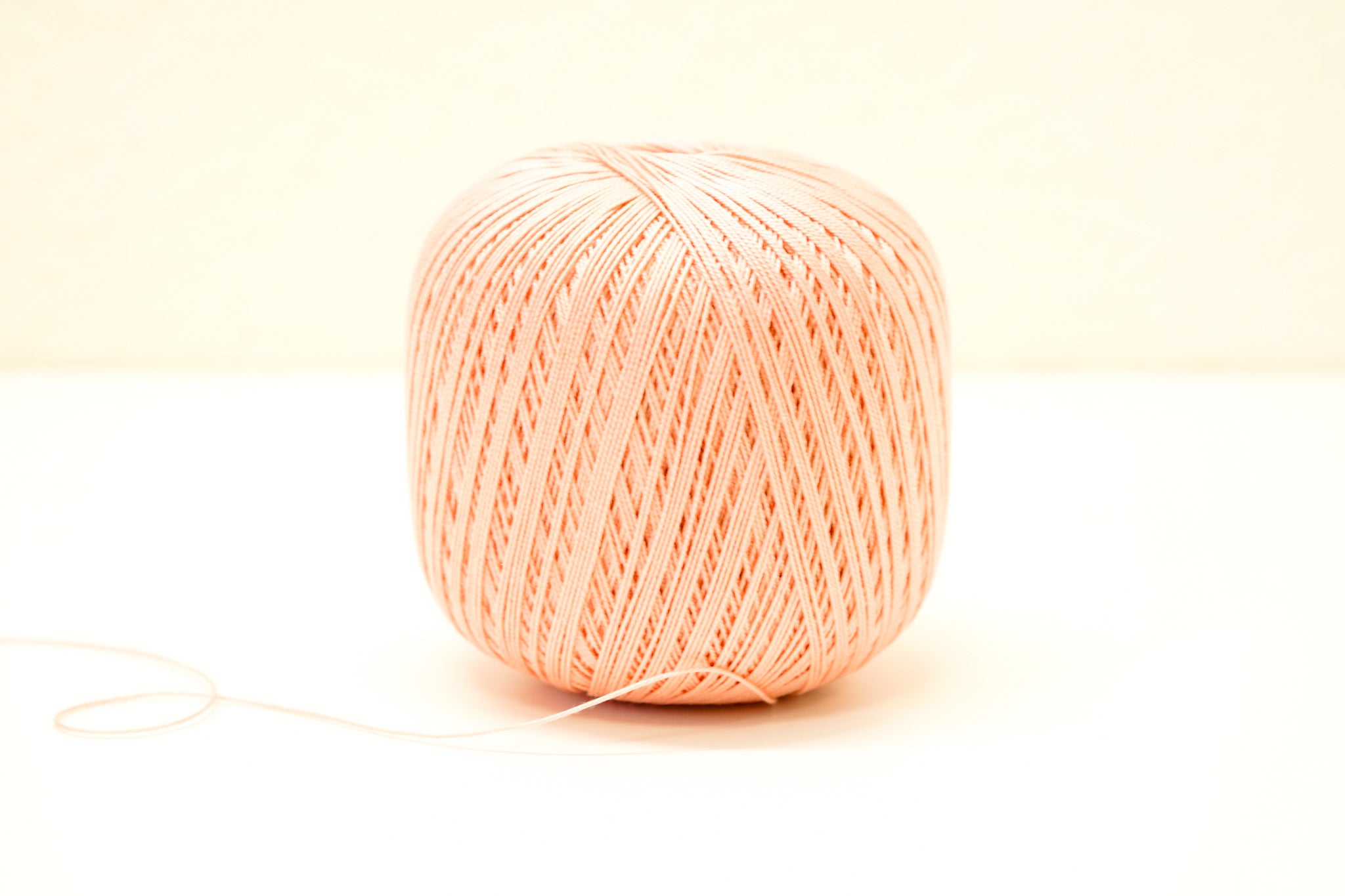 Light peach color mercerised cotton 100g/452m