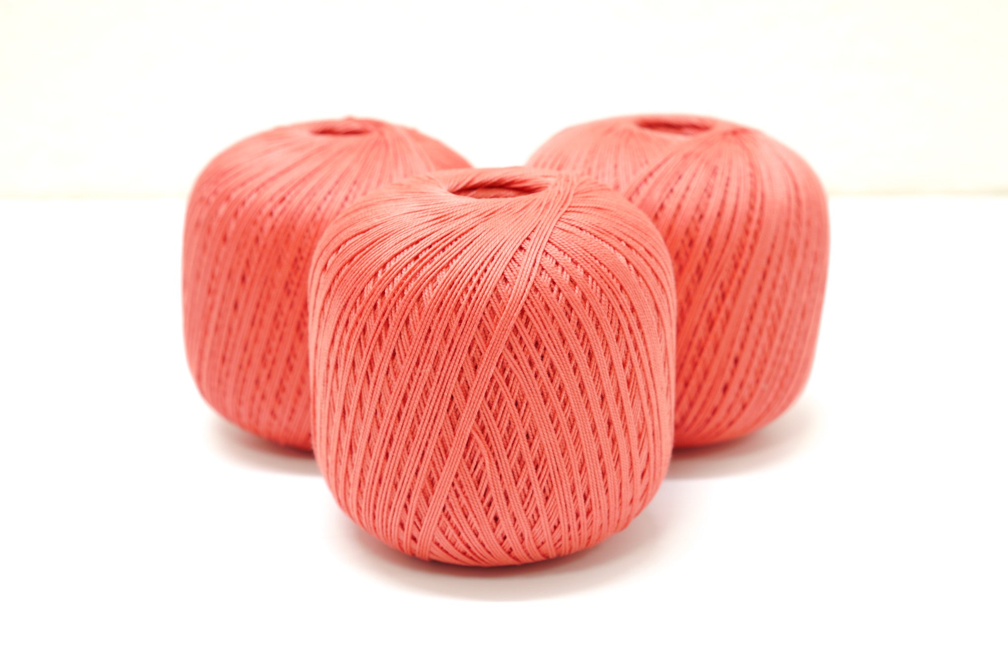 Coral color mercerised cotton 100g/452m