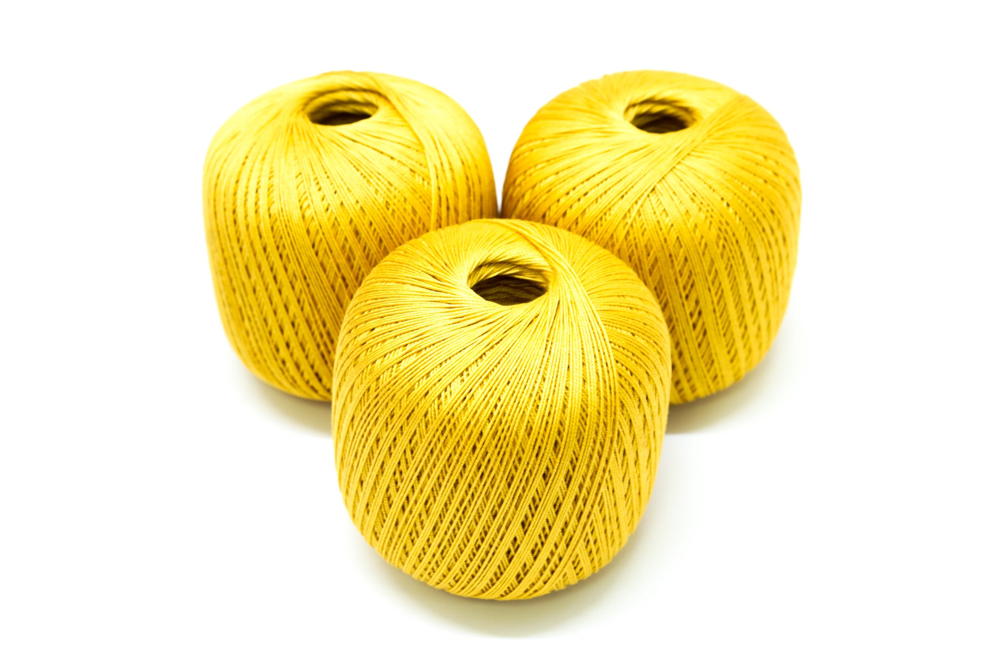 Honey-yellow mercerised cotton 100g/452m
