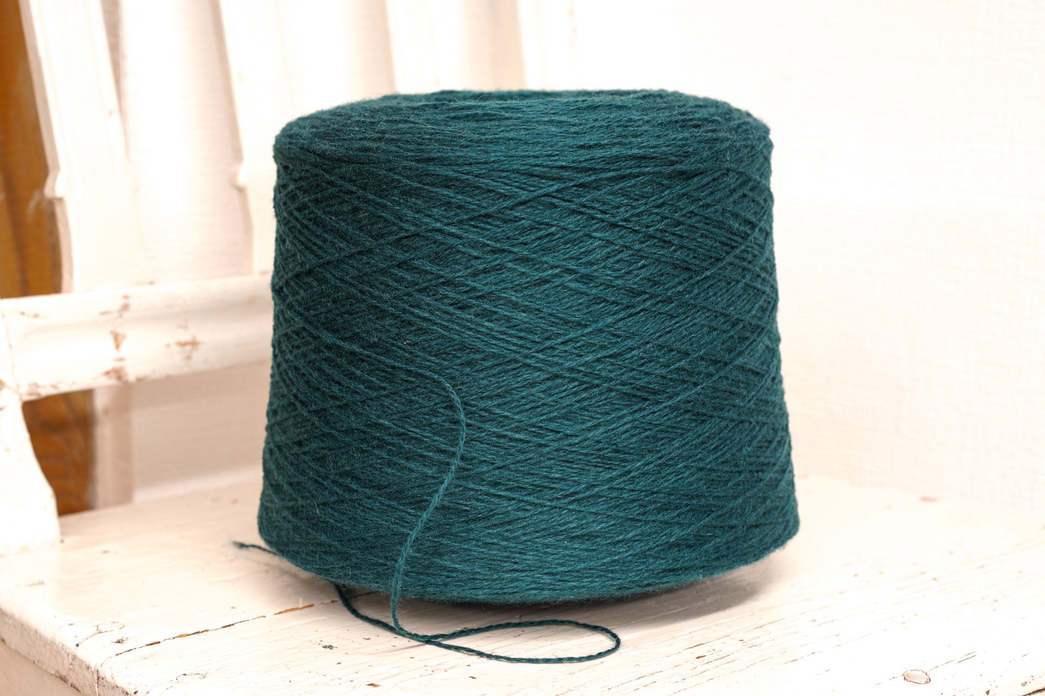 Emerald blue fingering wool in cone | emerald-blue-fingering-wool-in-cone