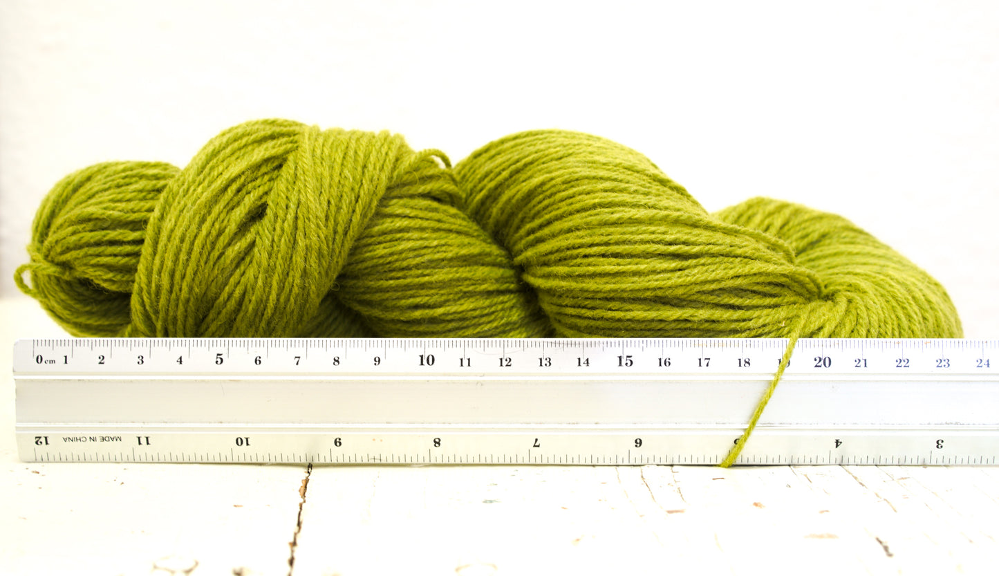 Lime green 60% wool and PO blend yarn, 100g/3,5oz.