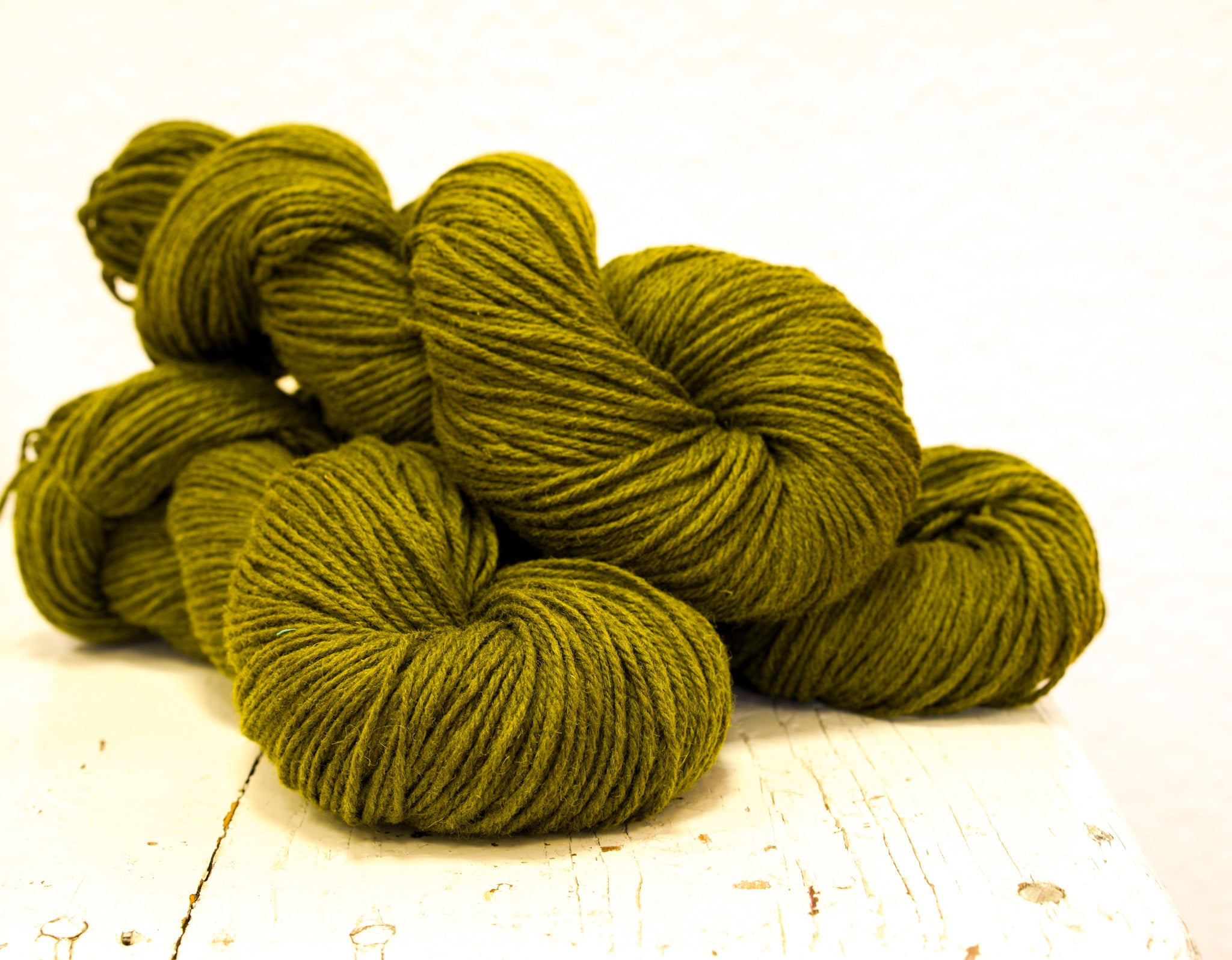 Moss green 60% wool and PO blend yarn, 100g/3,5oz.