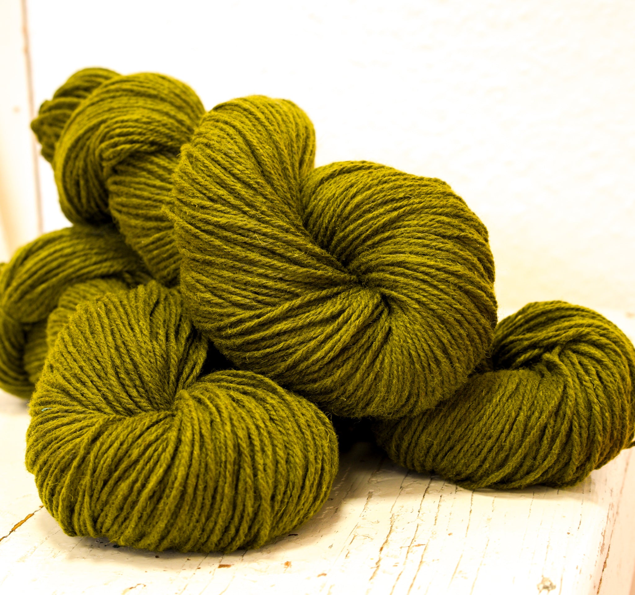Moss green 60% wool and PO blend yarn, 100g/3,5oz.