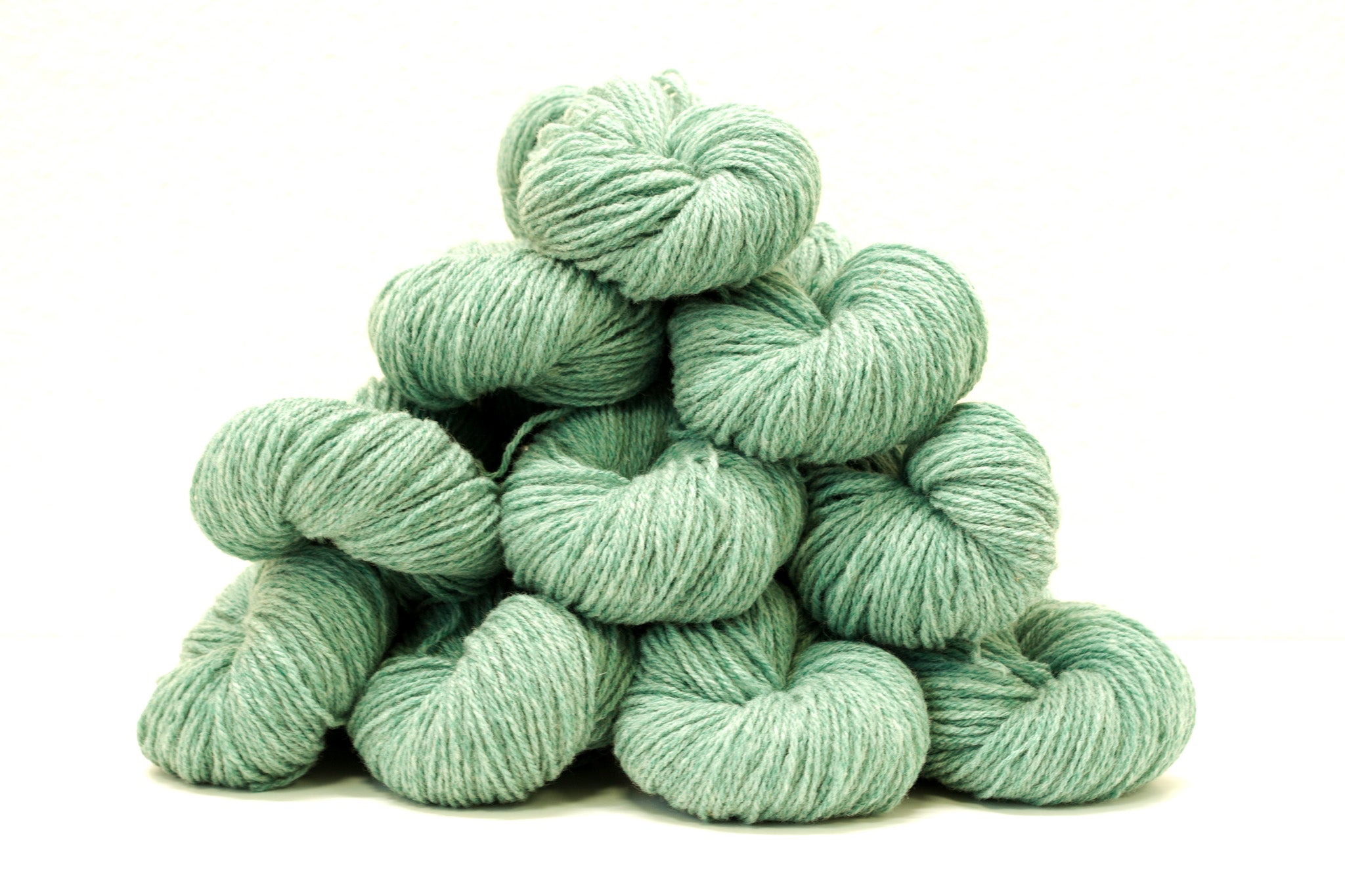 Green melange color Merino and Suffolk wool yarn blend
