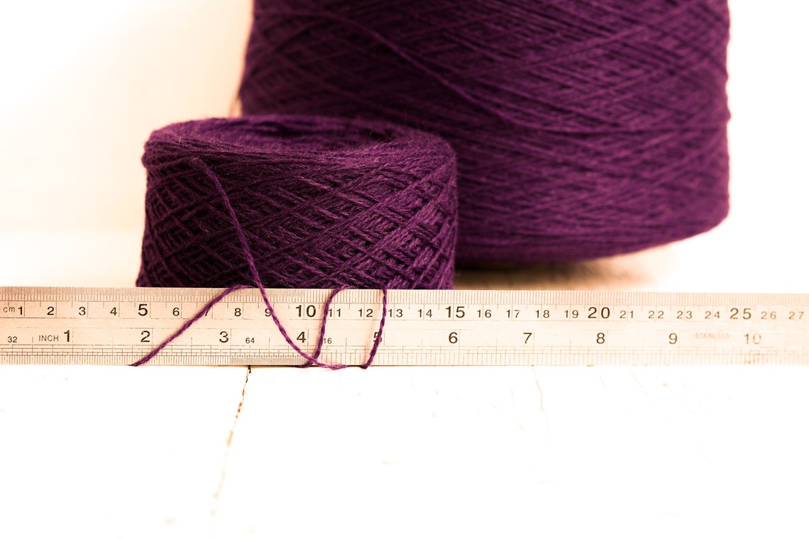 Raisin color wool yarn cone | raisin-color-wool-yarn-cone