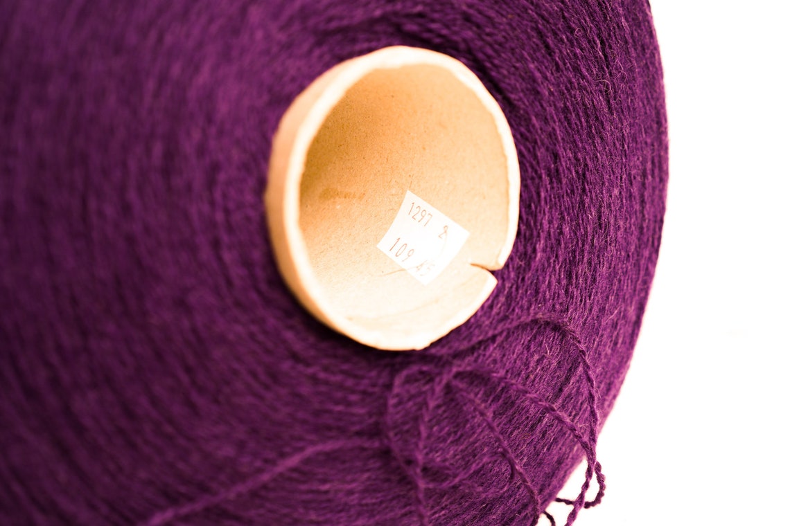 Raisin color wool yarn cone | raisin-color-wool-yarn-cone