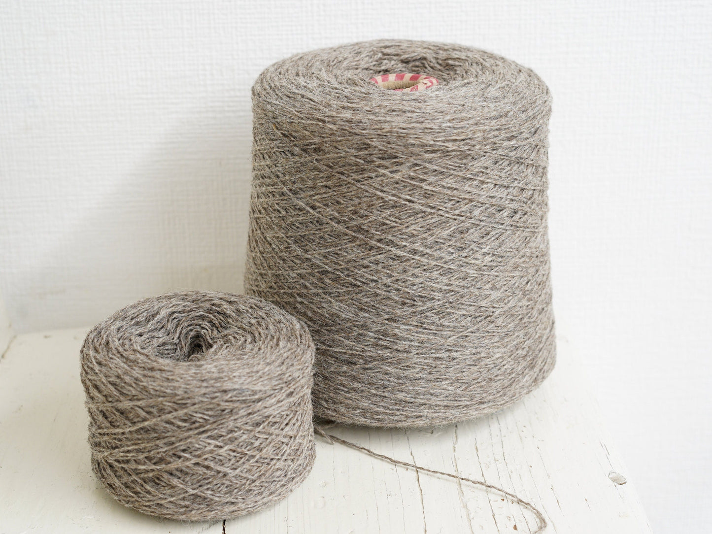 Grey-brown natural wool yarn in cone | grey-brown-natural-wool-yarn-in-cone