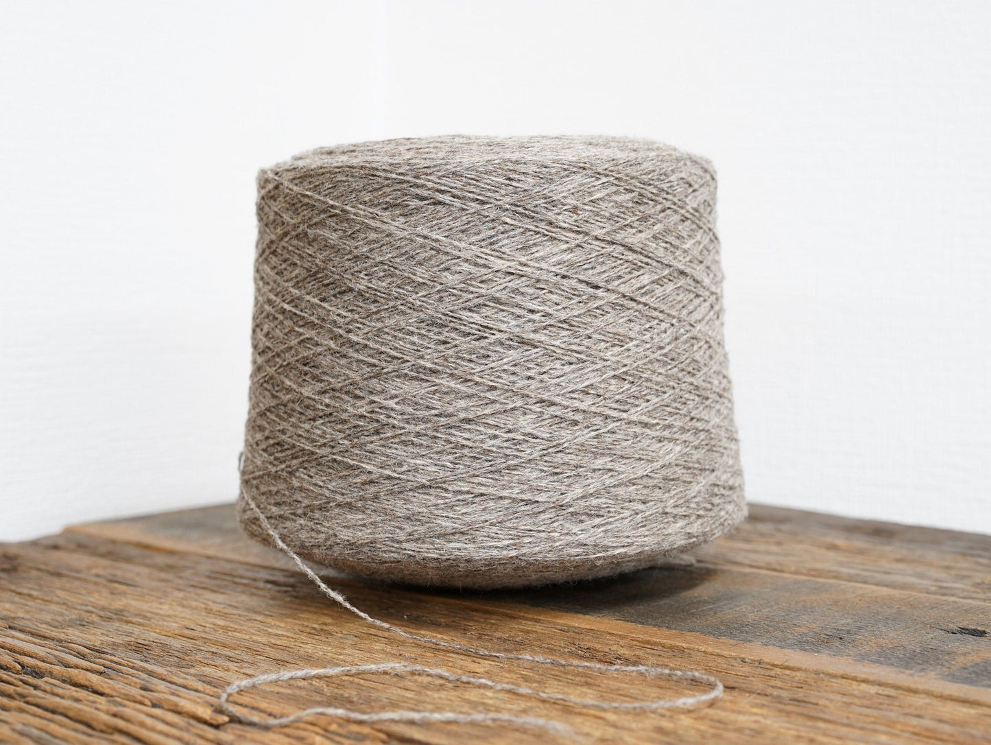 Grey-brown natural wool yarn in cone | grey-brown-natural-wool-yarn-in-cone