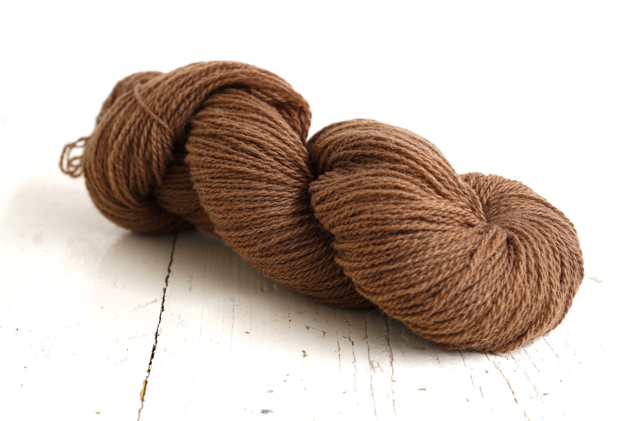 Brown and green shades of wool yarn | brown-and-green-shades-of-wool-yarn