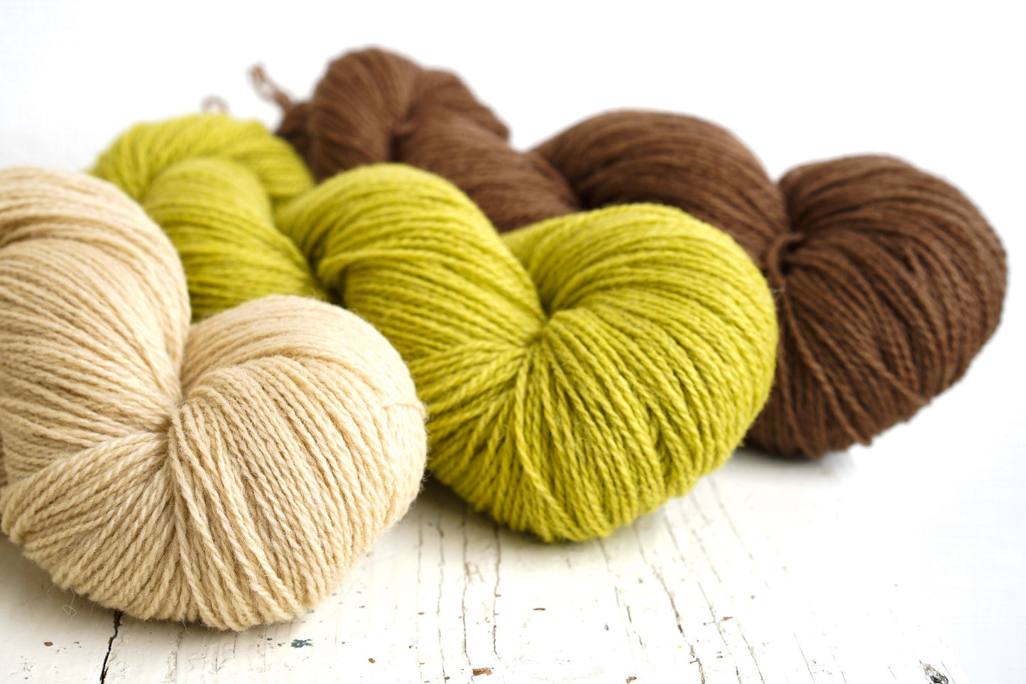 Brown and green shades of wool yarn | brown-and-green-shades-of-wool-yarn