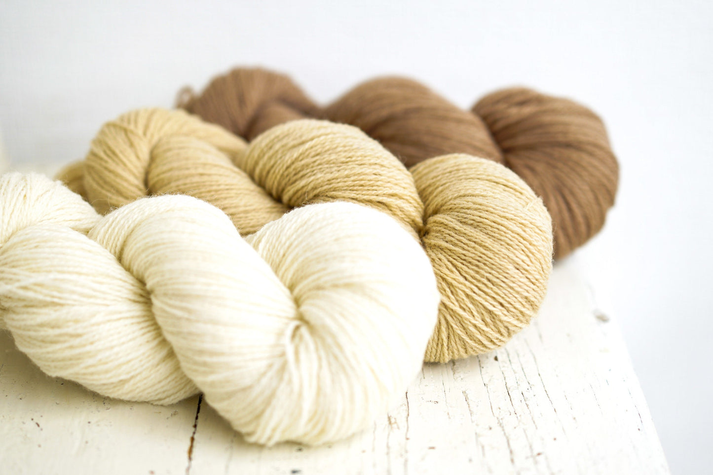White, beige, taupe shades of wool yarn | white-beige-taupe-shades-of-wool-yarn