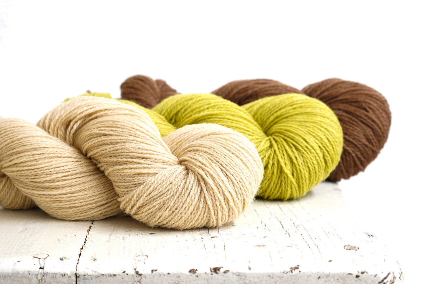 Brown and green shades of wool yarn | brown-and-green-shades-of-wool-yarn