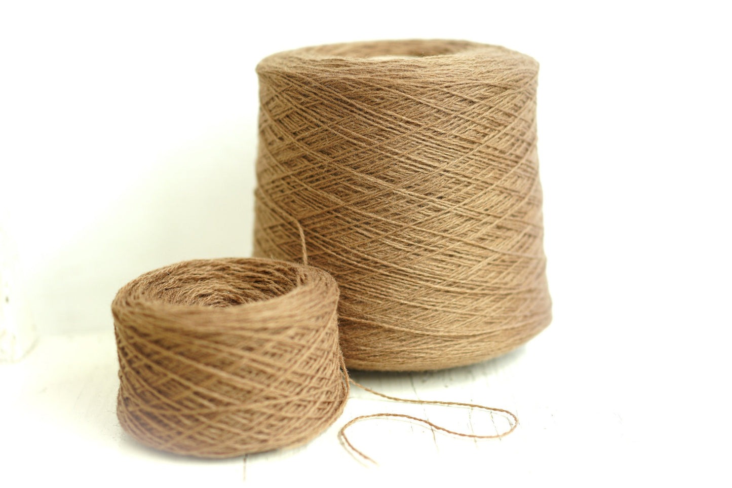 Sand brown wool yarn in cone | sand-brown-wool-yarn-in-cone