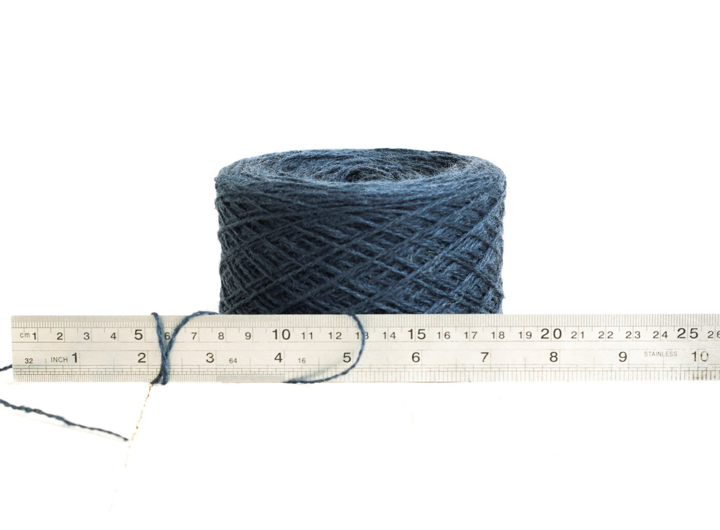 Denim blue fingering wool yarn in cones | denim-blue-fingering-wool-yarn-in-cones