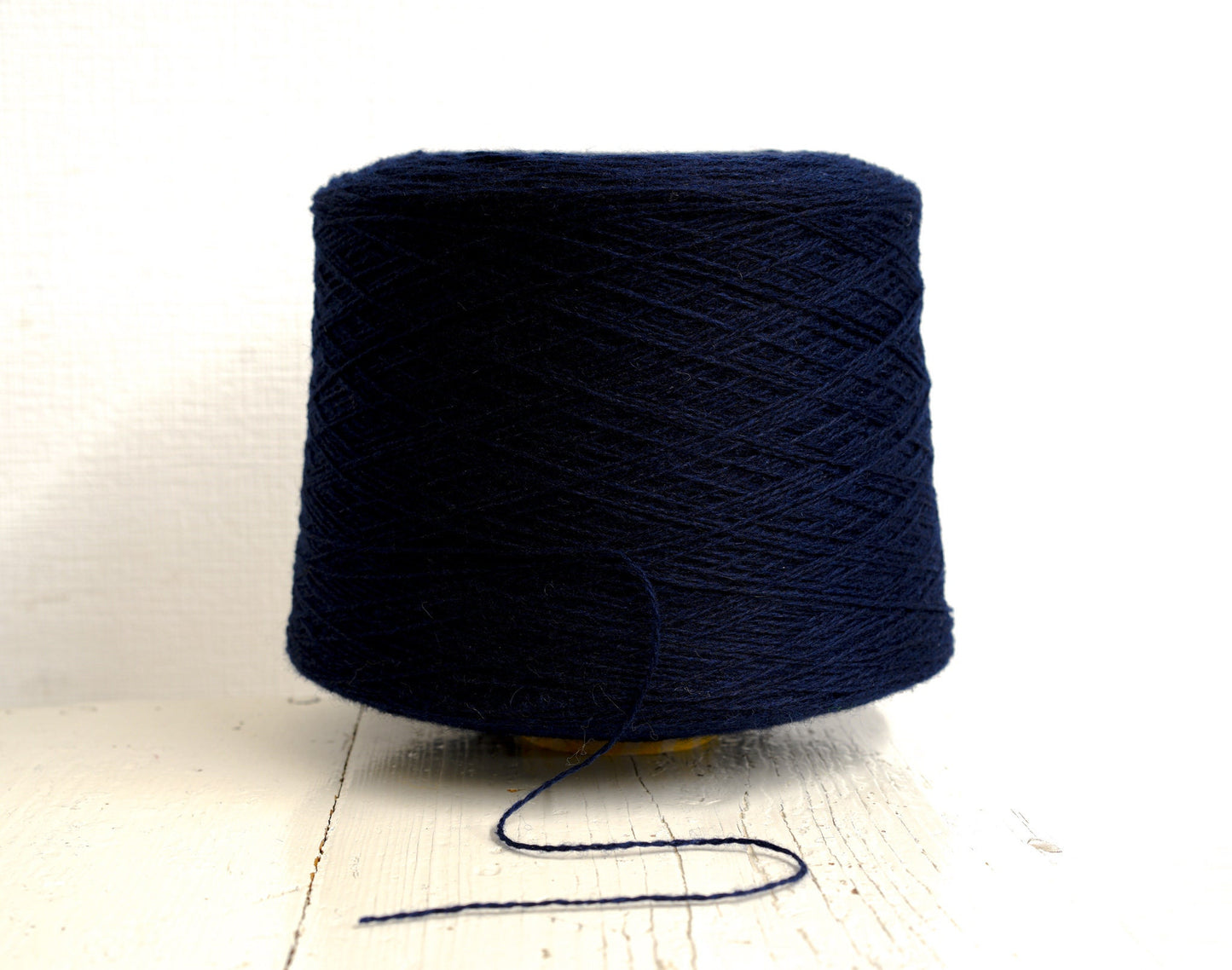Dark blue fingering wool yarn in cones | dark-blue-fingering-wool-yarn-in-cones