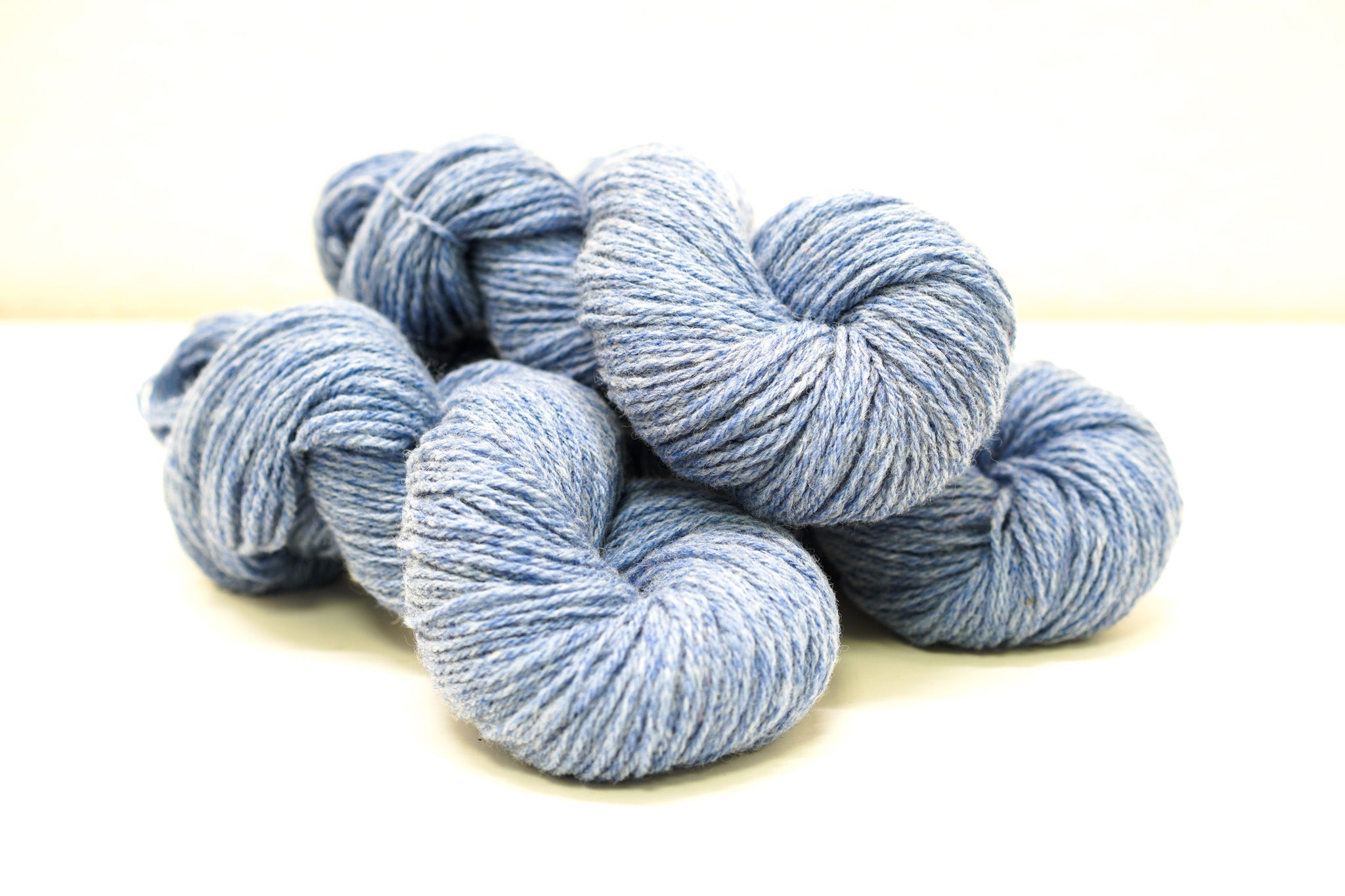 Blue melange color Merino and Suffolk wool yarn blend