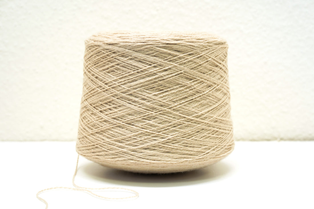 Ivory melange wool in cone - 260