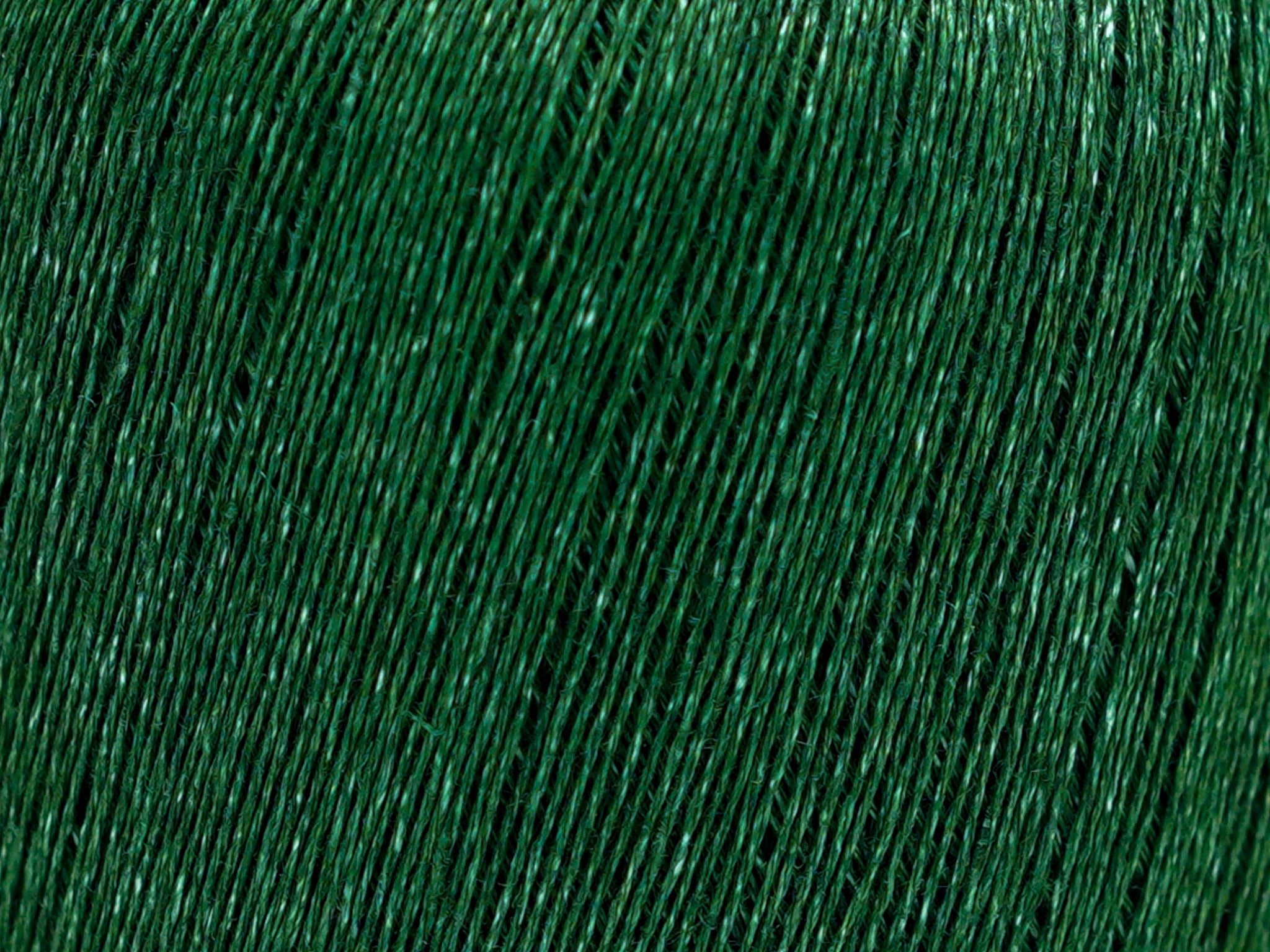 100% linen yarn in green mélange color 100g./600m.