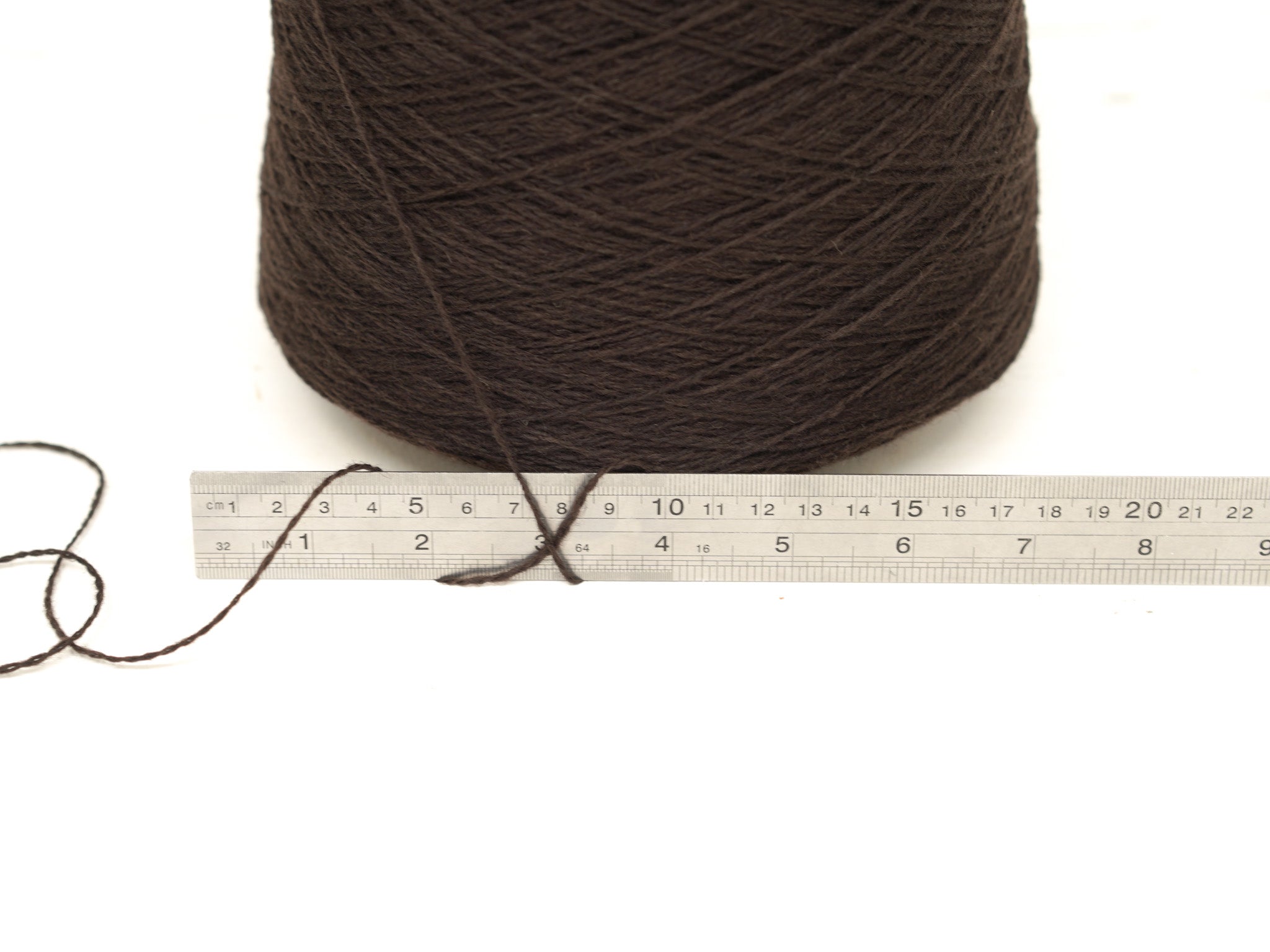 Dark brown color wool in cone - 269
