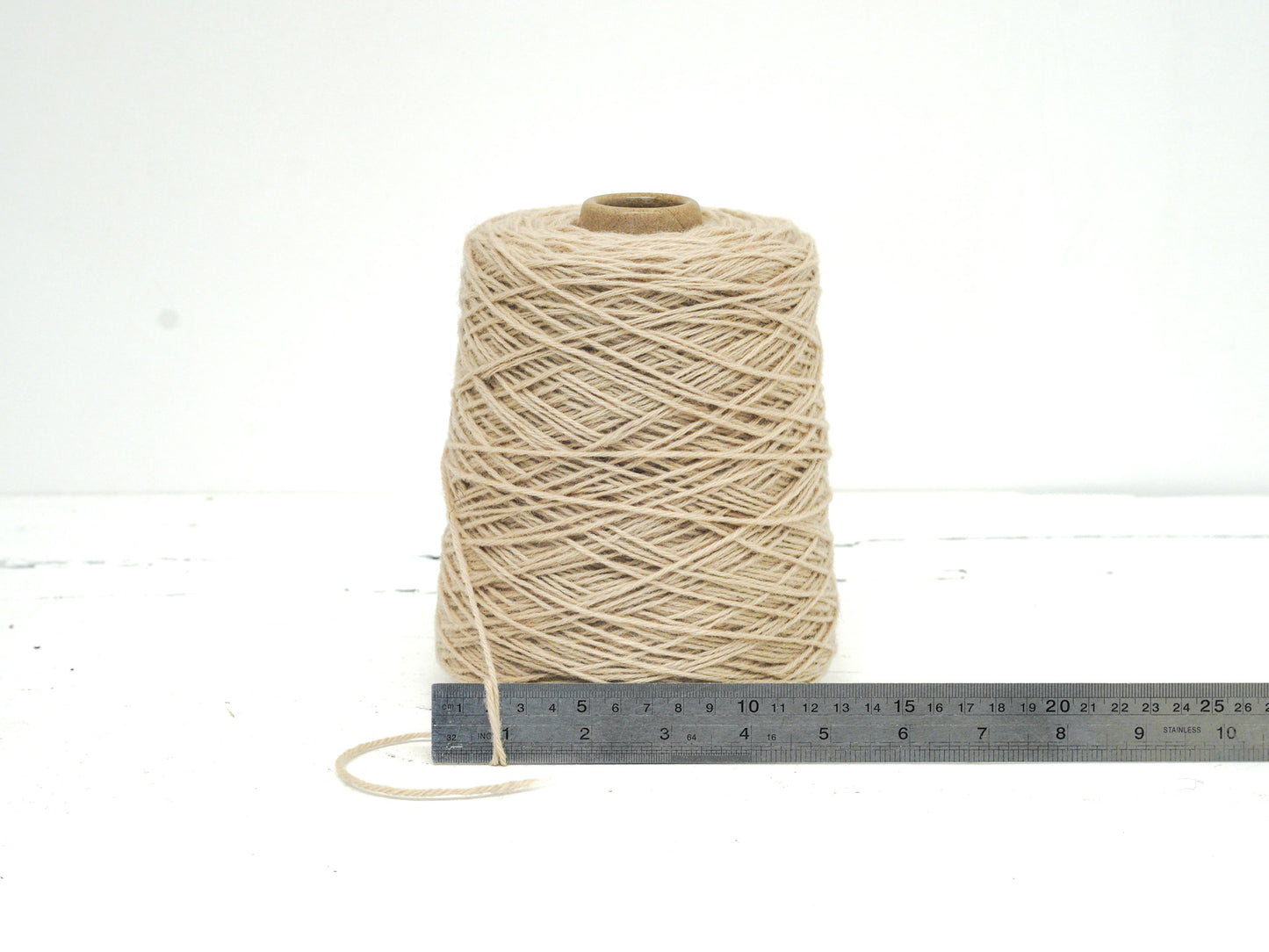 Ivory color wool yarn in cone - 260