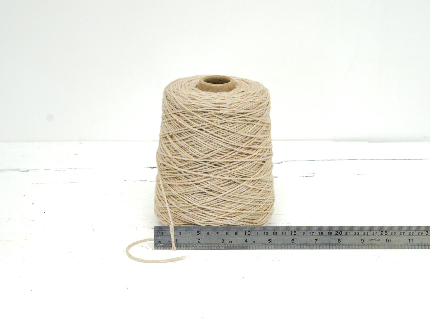 Ivory color wool yarn in cone - 260