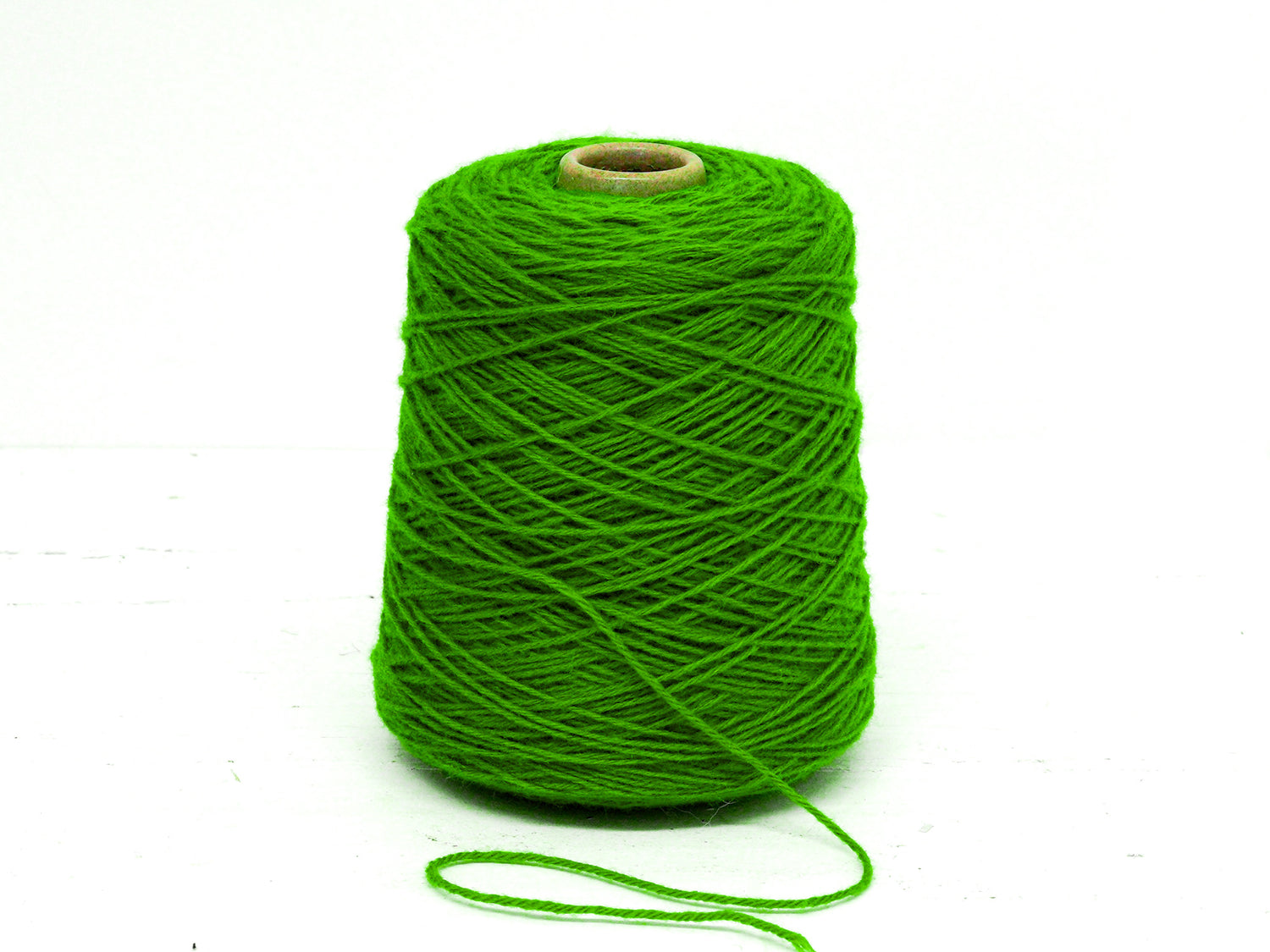 Bright green wool yarn in cone - 345