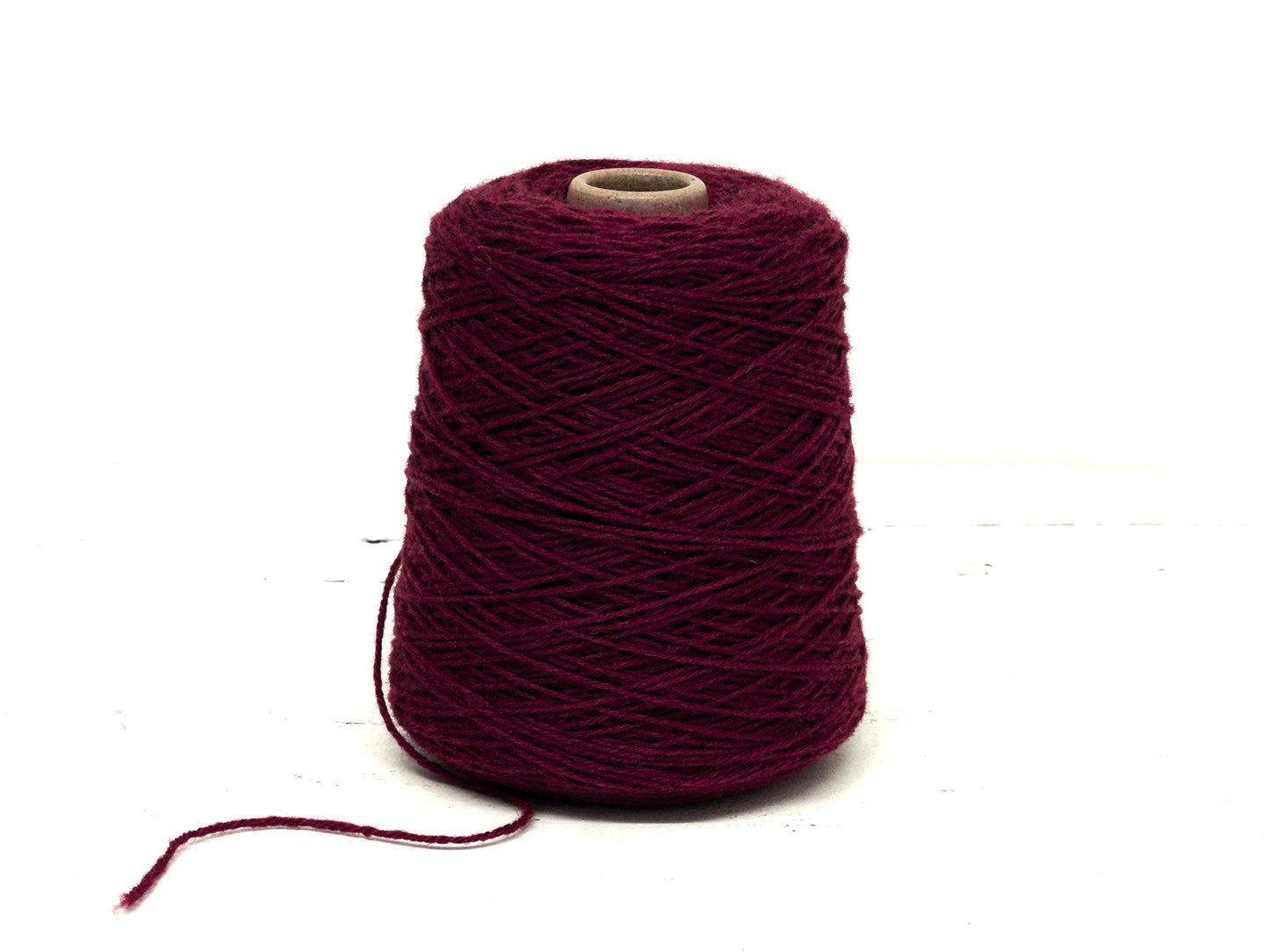 Burgundy red wool yarn in cone - 575