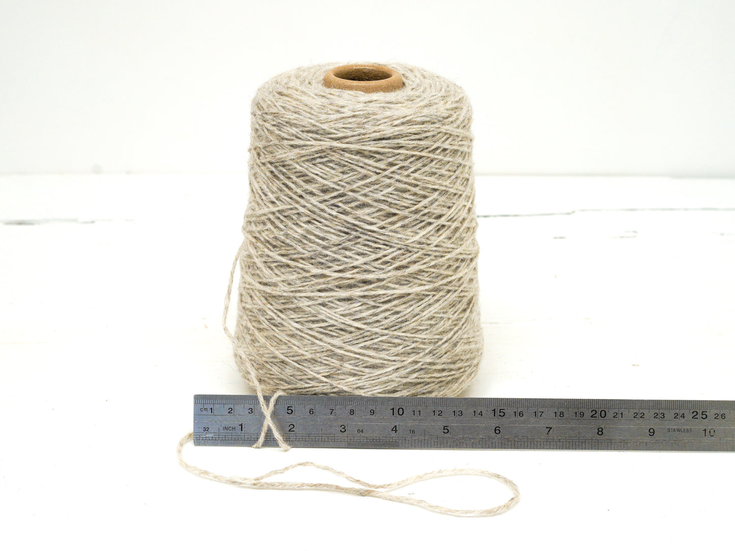 Grey-brown color wool yarn in cone - 265