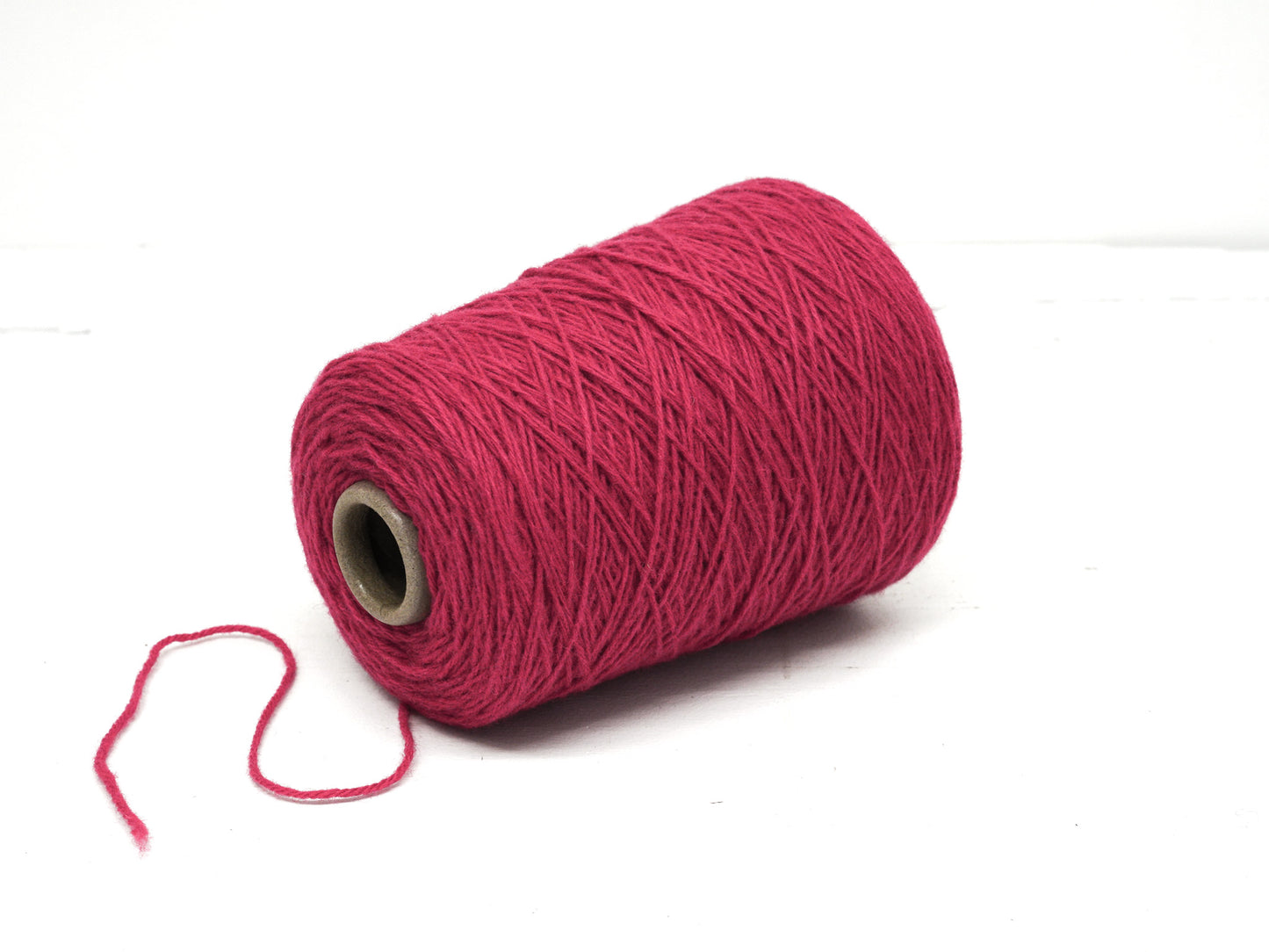 Raspberry wool yarn in cone - 555