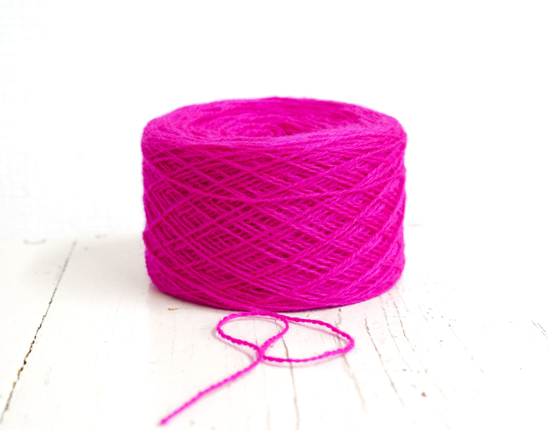 Neon pink New Zealand wool in a cone - 107
