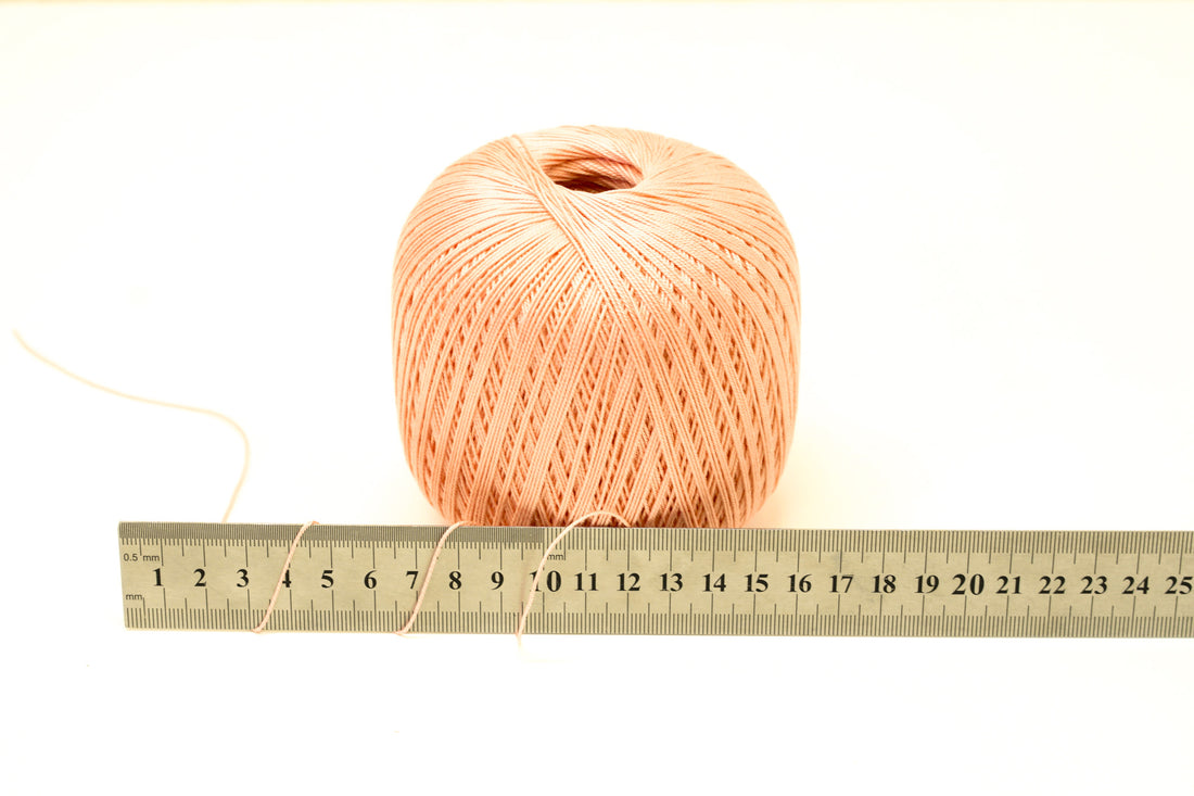 Light peach color mercerised cotton 100g/452m