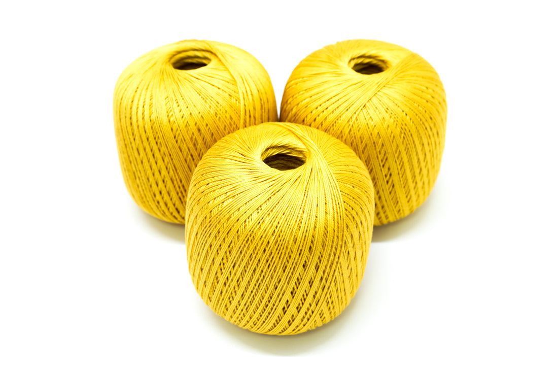 Honey-yellow mercerised cotton 100g/452m