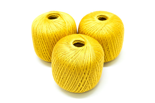 Honey-yellow mercerised cotton 100g/452m